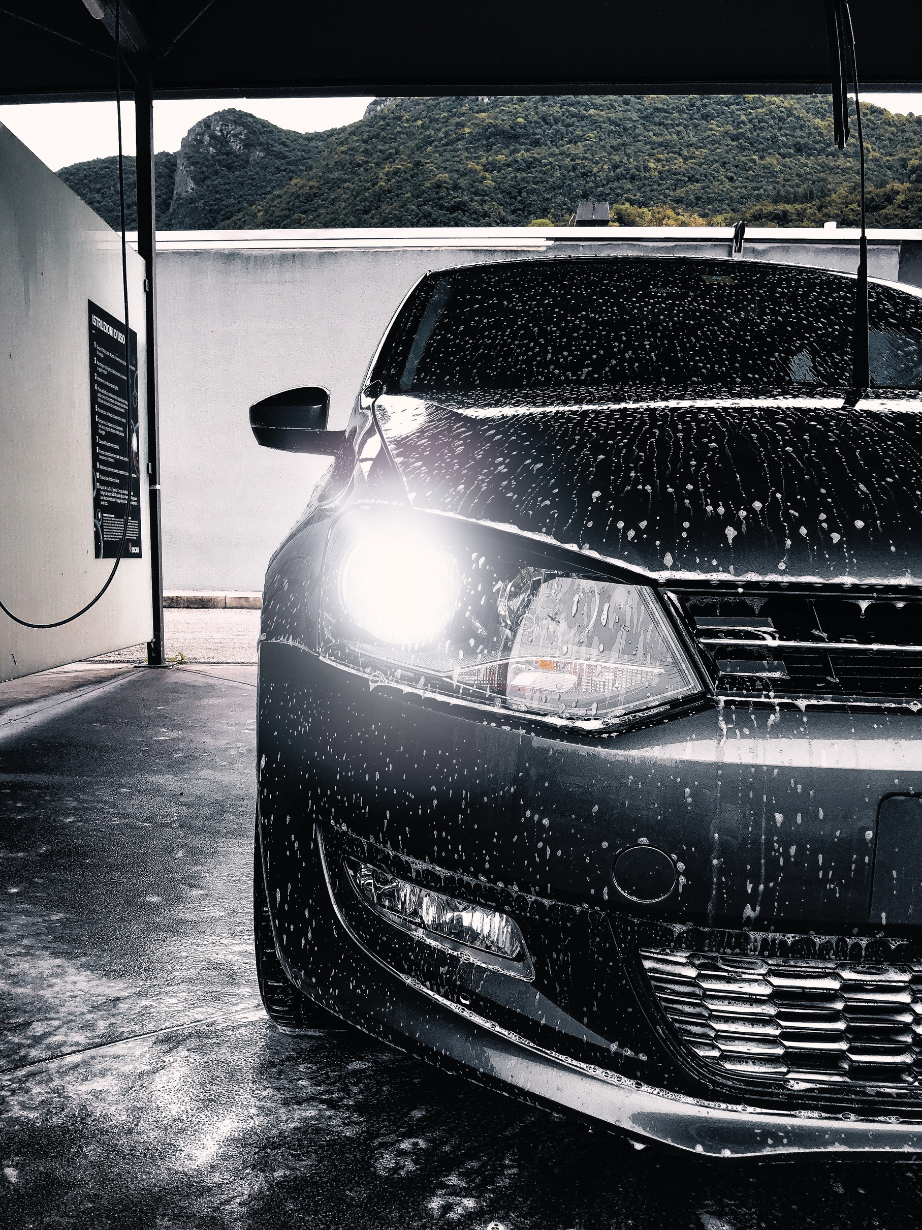 Gray Car Parked in the Car Port